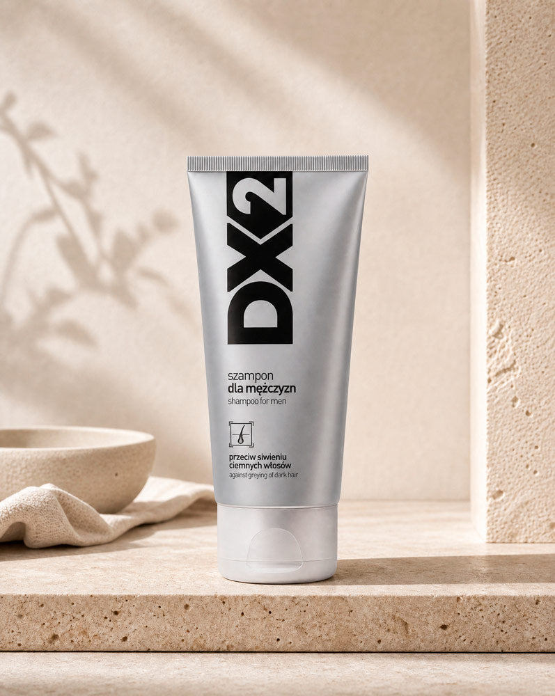 DX2 Shampoo Anti-Canas, tubo de 150 ml sobre travertino, vista frontal