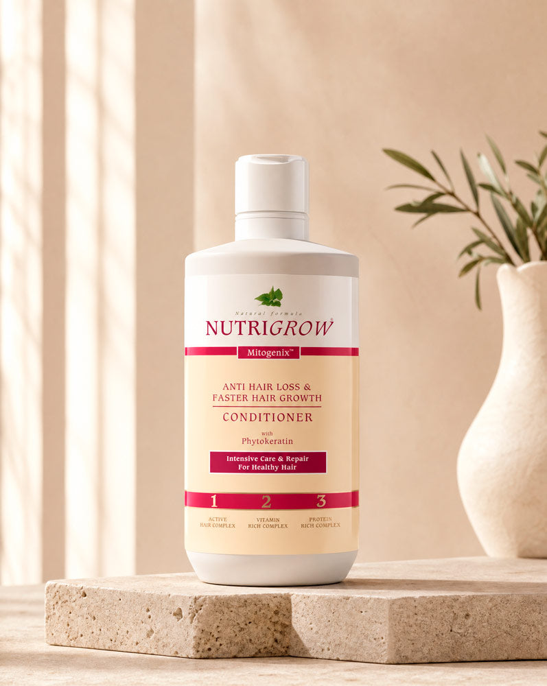 Nutrigrow Acondicionador Anticaída sobre repisa de piedra, vista tres cuartos